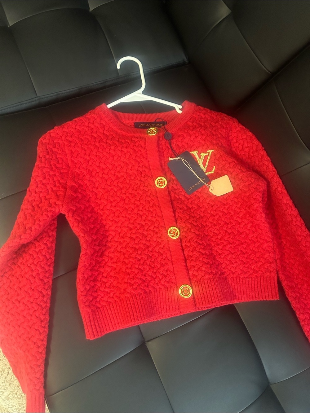 Bright red cardigan